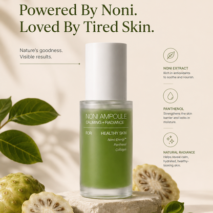 Skincare bottle with green liquid on a beige background with noni fruit and leaves.