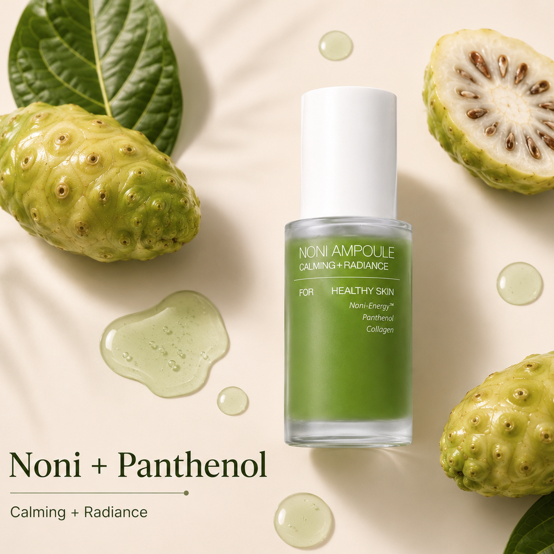 Skincare bottle with noni fruit and leaves on a beige background